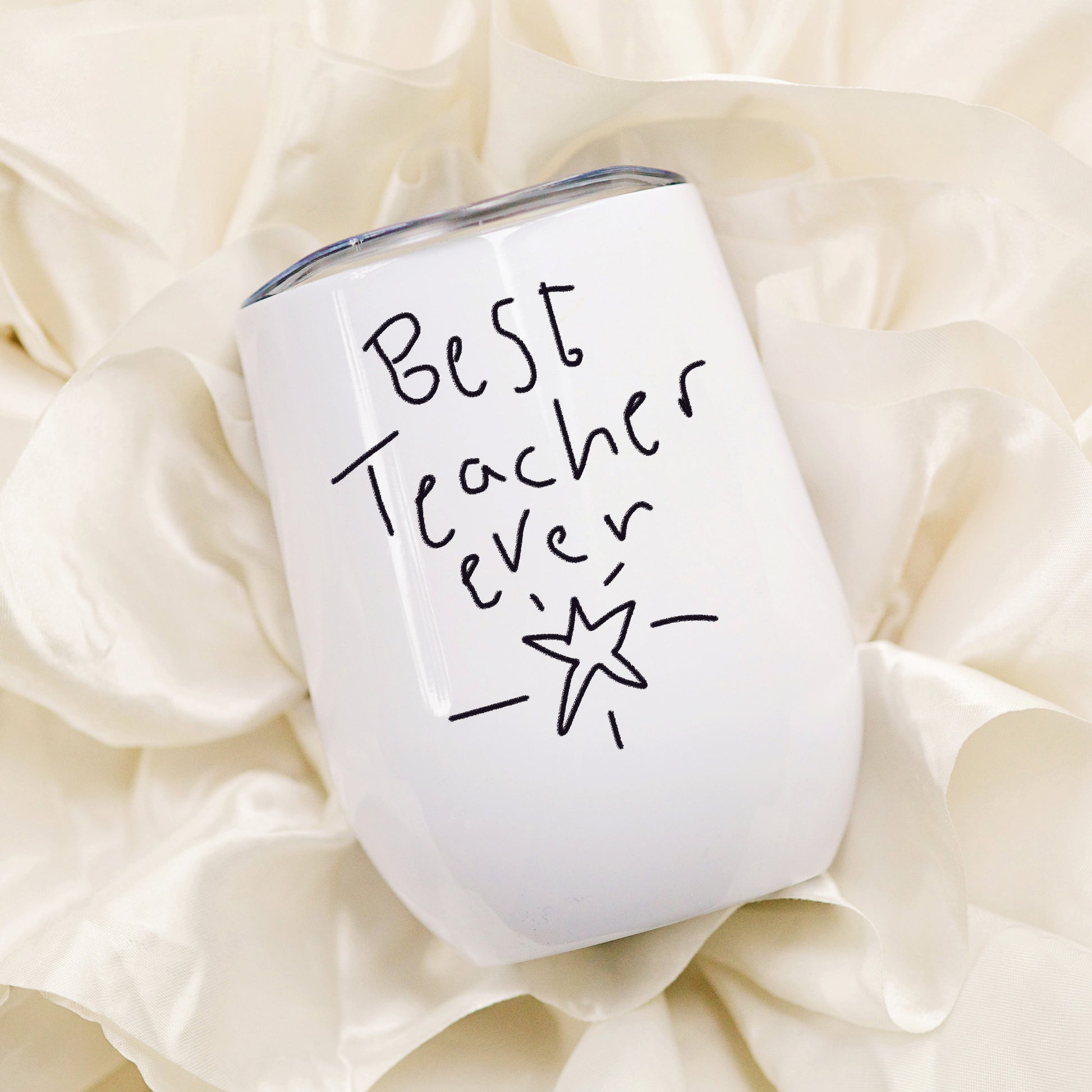 White tumbler with 'Best Teacher ever' text on a soft beige background | Little Heirloom