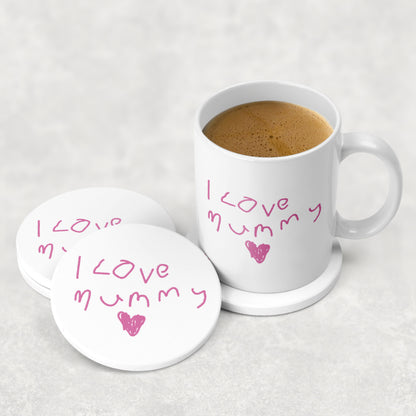 White mug with 'I love mummy' text and pink hearts, filled with coffee, on a white background.| Little Heirloom