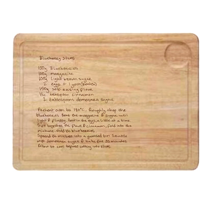 Wooden cutting board with handwritten recipe on a white background | Little Heirloom