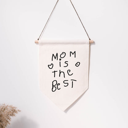 Canvas banner with 'Mom is the best' text on a white background | Little Heirloom