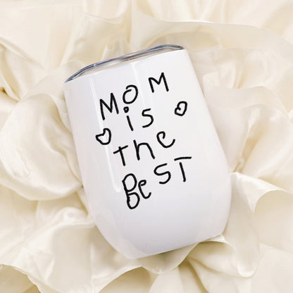 White tumbler with 'Mom is the best' text on a soft beige background | Little Heirloom
