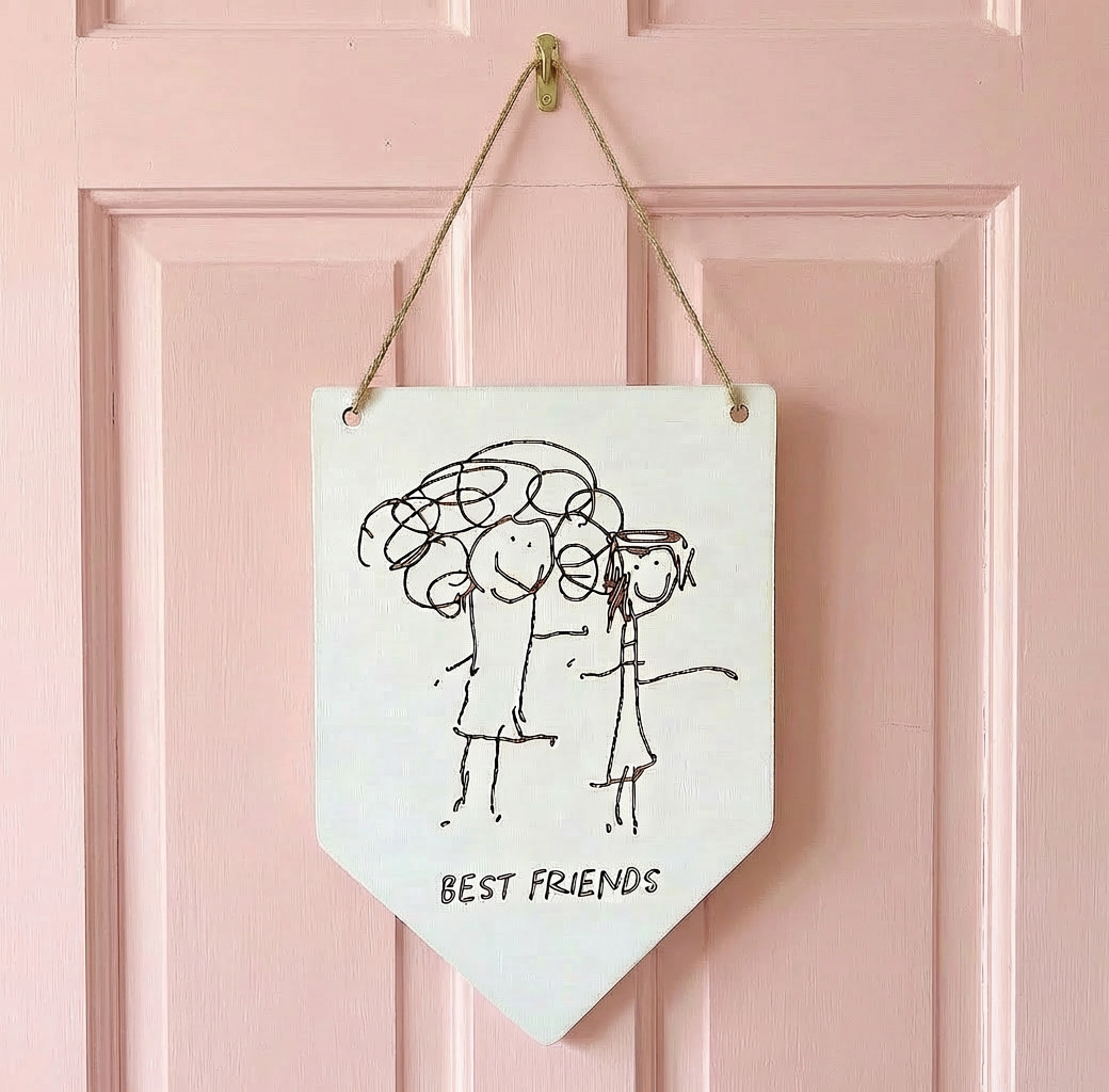 White wooden Pennant Flag hanging on a pink door with laser engraved child's drawing | Little Heirloom