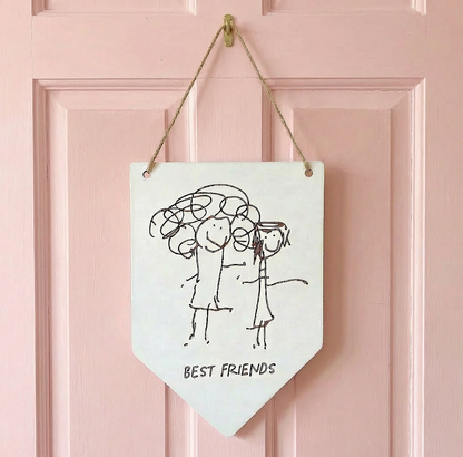 White wooden Pennant Flag hanging on a pink door with laser engraved child's drawing | Little Heirloom